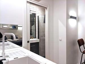 Et badeværelse på ººººMY CityCentre SOL WiFi AC SmartTVºººº