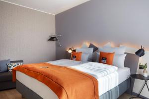 Rúm í herbergi á Holiday Inn - the niu, Hub Dusseldorf Messe by IHG