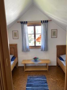 Postel nebo postele na pokoji v ubytování Apartmán U Růži