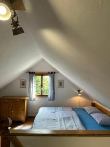 Postel nebo postele na pokoji v ubytování Apartmán U Růži