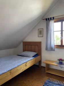 Postel nebo postele na pokoji v ubytování Apartmán U Růži