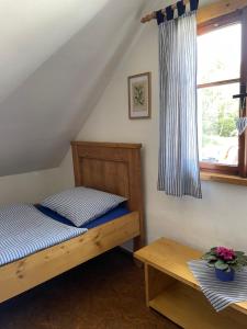 Postel nebo postele na pokoji v ubytování Apartmán U Růži