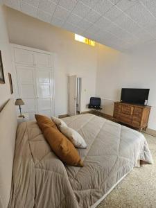 En eller flere senge i et værelse på Vitreaux