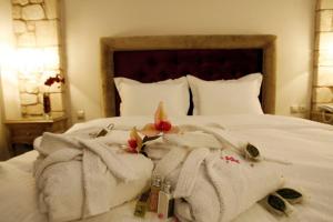 Ένα ή περισσότερα κρεβάτια σε δωμάτιο στο Diamond River Resort & Spa 