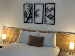 Postel nebo postele na pokoji v ubytování Hotel La Magdalena