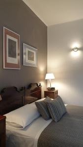 Posteľ alebo postele v izbe v ubytovaní bb26 Buoso apartment city center