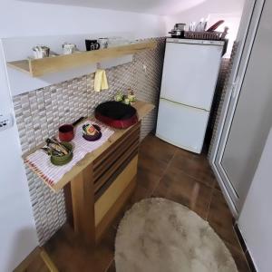 Kuchyň nebo kuchyňský kout v ubytování Apartman Centar Strpce