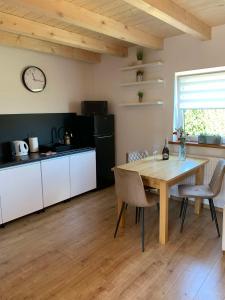 Η κουζίνα ή μικρή κουζίνα στο Apartament orzechowy superior