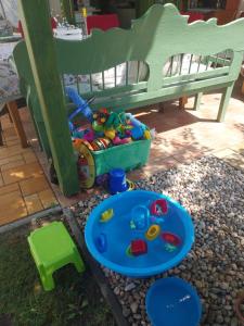 a childs play set in front of a bench at Rebeka Villa in Zamárdi