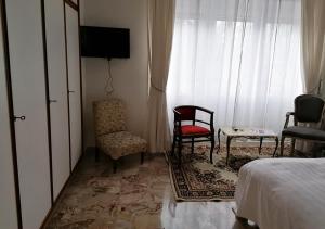 Postel nebo postele na pokoji v ubytování Gregory Place