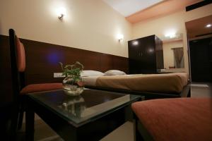Postel nebo postele na pokoji v ubytování Philomena Hotel & Apartment