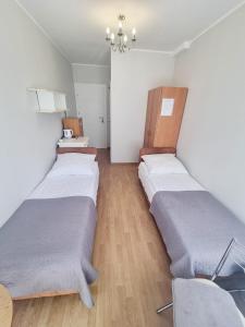 Postel nebo postele na pokoji v ubytování Pokoje Basia