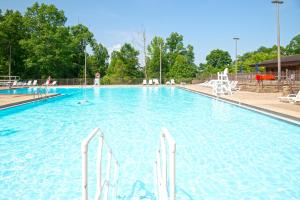 a large swimming pool with blue water at Cumberland Falls State Resort Park in Honeybee