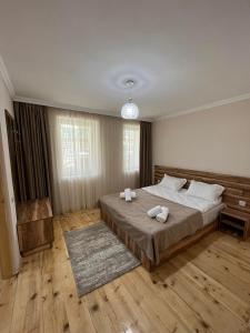 Posteľ alebo postele v izbe v ubytovaní Polaris Kazbegi