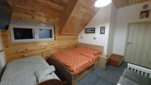 Voodi või voodid majutusasutuse VIP Durmitor toas