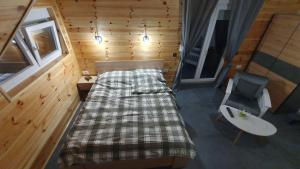 Voodi või voodid majutusasutuse VIP Durmitor toas