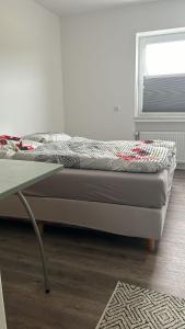 Una cama o camas en una habitación de Motel Munsch