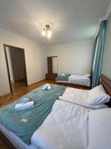 Posteľ alebo postele v izbe v ubytovaní Polaris Kazbegi