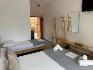 Postel nebo postele na pokoji v ubytování Escape Rooms