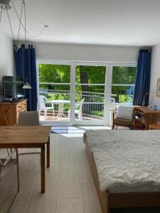 Μπαλκόνι ή βεράντα στο Ferienapartment Landhaus Ostseeblick, ruhig im Wald gelegen, kostenfreier Parkplatz, ideal für Fahrradtouren