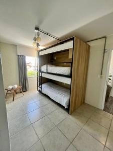 Cama ou camas em um quarto em ZAG Coliving Punta del este