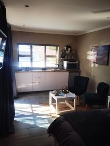 TV a/nebo společenská místnost v ubytování Calla—Cottage + 2 fotografie