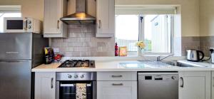 A kitchen or kitchenette at Ben Haven Self Catering Accommodation