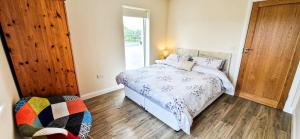 A bed or beds in a room at Ben Haven Self Catering Accommodation