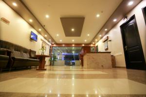 TV a/nebo společenská místnost v ubytování Philomena Hotel & Apartment