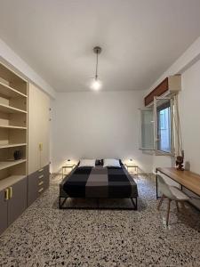 Ένα ή περισσότερα κρεβάτια σε δωμάτιο στο Residenza Civico 26