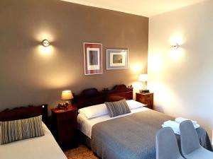 Posteľ alebo postele v izbe v ubytovaní bb26 Buoso apartment city center