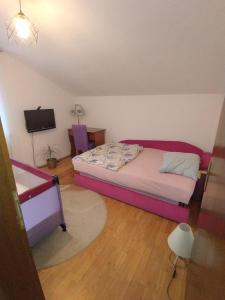 Postel nebo postele na pokoji v ubytování Apartman Sarajevo 202