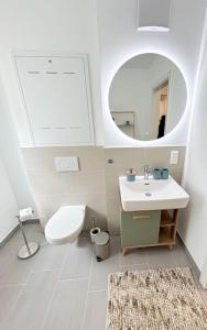 Koupelna v ubytování Dachgeschoß Maisonette im Altbau