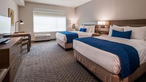 Postel nebo postele na pokoji v ubytování Best Western Plus Executive Residency Austin - Round Rock