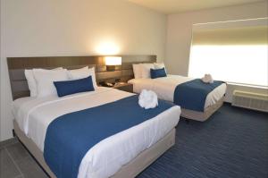 Postel nebo postele na pokoji v ubytování Best Western Plus Executive Residency Austin - Round Rock