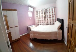 Foto de Casa Com 2 quartos, Garagem Ar tv