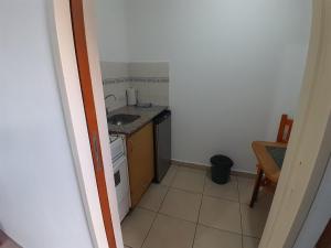 Kuchyň nebo kuchyňský kout v ubytování Apart Hotel Nonquen