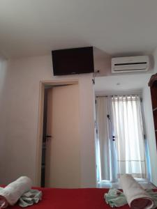 TV a/nebo společenská místnost v ubytování Apart Hotel Nonquen