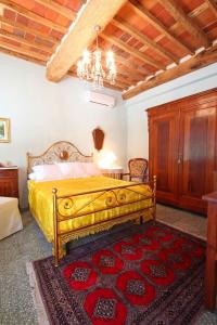 Un pat sau paturi într-o cameră la Rustico del Chiasso