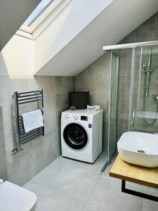 Koupelna v ubytování Apartmány Runi