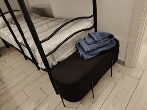 Postel nebo postele na pokoji v ubytování CASA DI LISA Intero appartamento 45mt con parcheggio