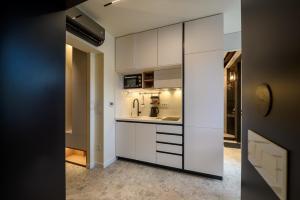 Kuchyň nebo kuchyňský kout v ubytování Modular Sea view Spa Studio