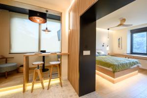 Postel nebo postele na pokoji v ubytování Modular Sea view Spa Studio