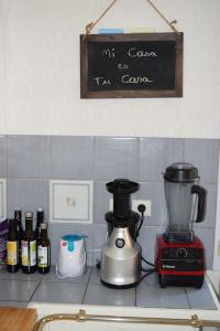 a kitchen counter with a coffee maker and a blender at maison familiale gap PROMO in Gap