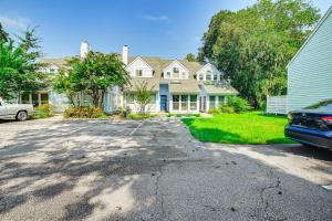 a house with a car parked in the driveway at Chic Murrells Inlet Getaway about 2 Mi to Marsh Walk! in Myrtle Beach