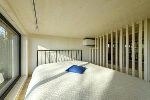 Postel nebo postele na pokoji v ubytování EstBergHouse Klaasmaja
