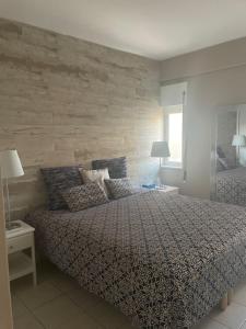 Postel nebo postele na pokoji v ubytování Apartamento ARMAÇÃO PÊRA