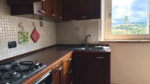 Kuchyň nebo kuchyňský kout v ubytování S214 - Sirolo, trilocale con giardino in zona tranquilla + 11 fotografií