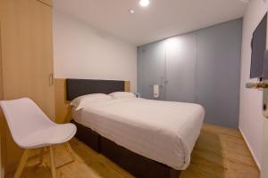Postel nebo postele na pokoji v ubytování Elmark Hotel Melaka