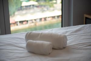 Postel nebo postele na pokoji v ubytování Hotel Luciano